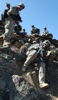 U.S. Army Soldiers of Headquarters and Headquarters Company, 2nd Battalion, 327th Infantry Regiment, negotiate the rough terrain along the way to their objective during Joint Operation Eagle Claw II in Kunar Province Dec. 10th. (Photo by U.S. Army Spc. Andy Barrera, Task Force Bastogne)