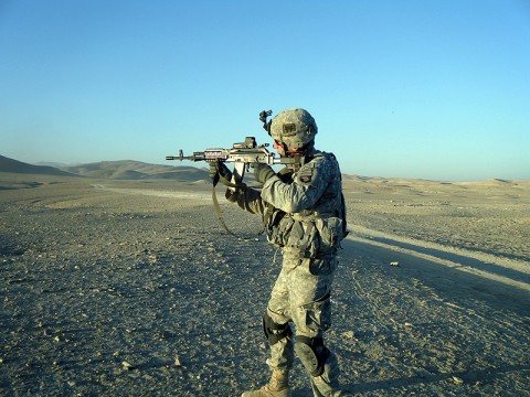 U.S. Army 2nd Lt Peter Sprenger from Stockton, CA, Platoon Leader for Company A, 3rd Battalion, 187th Infantry Regiment, fires the Polish AR-47 as part of the officer exchange with Polish Battle Group Alpha Dec. 10th. (Photo by U.S. Army 1st Lt. R.J. Peek, Task Force Iron Rakkasan)