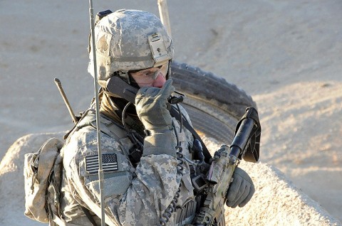 U.S. Army Capt. Todd M. Tompkins, commander of Headquarters and Headquarters Company, 1st Battalion, 506th Infantry Regiment, 4th Brigade Combat Team, 101st Airborne Division maintains radio communications with the other elements of his company during Operation Steel Sky, an air assault mission near the village of Shakhmodkhel Dec. 21st. (Photo by Spc. Luther L. Boothe Jr., Task Force Currahee Public Affairs Office)