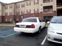 White Crown Victoria possibly used to impersonate a Police Car.