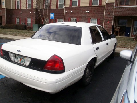 White Crown Victoria possibly used to impersonate a Police Car.