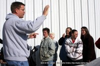 A Manna Café Ministries volunteer informing the people in line they have reached their limit, and could accept no more people for assistance on this day.