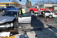 Officer Joe Shrum checking the seatbelt.