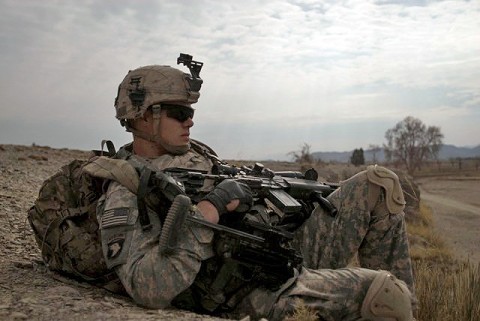 U.S. Army Spc. Jesse Bryant, an infantryman with 2nd Platoon, Company B, 1st Battalion 187th Infantry Regiment, 101st Airborne Division, from Bumpass, VA, watches over a wadi system with his M14 rifle as 1st Plt. patrols in Sabari District Dec. 30th. (Photo by U.S. Army Staff Sgt. Andrew Guffey, Task Force Rakkasan)