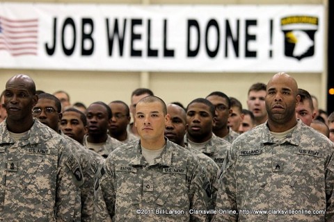 Soldiers of the 3rd Brigade Combat Team wait for a few moments with their families