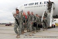 The first 3rd Brigade Combat Team soldier heads for the hanger after getting off the plane.