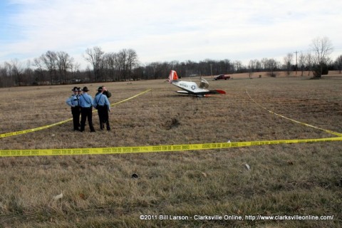 Sheriff's Deputies gather around FAA representative Gerald A. Mzrtelli Jr 