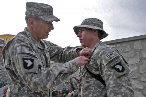 U.S. Army Cpl. Joshua M. Frappier, team leader for 1st Platoon, Headquarters and Headquarters Company, 2nd Battalion, 327th Infantry Regiment, 1st Brigade Combat Team, 101st Airborne Division, is presented with a Silver Star Medal with Valor by U.S. Army Gen. David Petraeus, International Security Assistance Force commander, Jan. 6th for heroic actions taken during Operation Strong Eagle. (Photo by U.S. Army Spc. Richard Daniels, Task Force Bastogne Public Affairs)