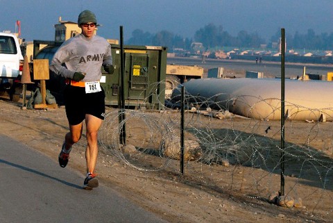 U.S. Army Maj. Patrick Smock of Liberty Hill, Texas, runs the Miami Marathon satellite race at Forward Operating Base Fenty in eastern Afghanistan Jan. 30th. Smock, an orthopaedic surgeon assigned to 745th Forward Surgical Team and attached to 1st Brigade Combat Team, 101st Airborne Division, ran the 26.2-mile marathon in 3 hours, 27 minutes in eastern Afghanistan. (Photo by U.S. Army Spc. Richard Daniels Jr., Task Force Bastogne Public Affairs)