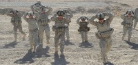 U.S. Army Soldiers from 4th Brigade Combat Team, 101st Airborne Division, do lunges as part of the “stress shoot” at Forward Operating Base Sharana Jan. 9th. (Photo by U.S. Army Sgt. Luther L. Boothe Jr., Task Force Currahee Public Affairs)