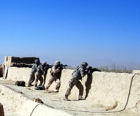 Soldiers with Company C, 3rd Battalion, 187th Infantry Regiment, 3rd Brigade Combat Team, 101st Airborne Division and the Polish Battle Group A pull security from a rooftop during a combined operation in Andar District Dec. 30th. The joint forces combined with local Afghan Uniformed Police officers to seize four caches of bomb-making materials. (Photo by U.S. Army Capt. Justin Quisenberry, Task Force Iron Rakkasan)