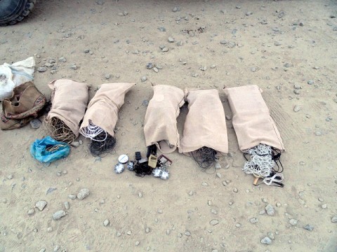 Material seized from an improvised explosive devise factory is displayed Dec. 31st. Soldiers from Task Force White Eagle’s Battle Group Alpha and Company C, 3rd Battalion, 187th Infantry Regiment, 3rd Brigade Combat Team, 101st Airborne Division conducted a combined patrol in a village in Andar District Dec. 30th and discovered the IED factory, killed two insurgents and detained three insurgents. (Courtesy photo)