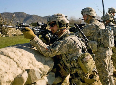 U.S. Army Staff Sgt. John Wood, a squad leader with 2nd Platoon, Company B, 1st Battalion, 187th Infantry Regiment, from Lake City, FL, looks for hostile forces as leaders meet with local nationals during a patrol in Zambar, Afghanistan, Jan. 18th. (Photo by U.S. Army Staff Sgt. Andrew Guffey, Task Force Rakkasan Public Affairs Office)