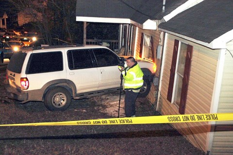 Officer VanBeber taking pictures of the scene. (Photo by CPD-Jim Knoll)