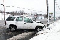 Crash into a utility pole on Riverside Drive – Officer Robert Delgiorno- Vehicle slid on the slush into the pole. (Photo by Jim Knoll-CPD)