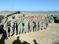 U.S. Army Soldiers from Battery B, 4th Battalion of the 320th Field Artillery Regiment, 4th Brigade Combat Team, 101st Airborne Division stand in formation in front of an artillery gunline in Paktika Province in September. (Courtesy photo)