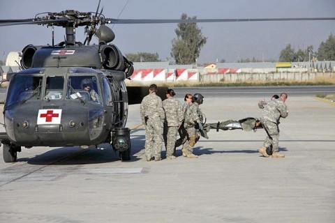 Soldiers in Company C DUSTOFF, Task Force Phoenix, 10th Combat Aviation Brigade, TF Falcon, remove a patient from a UH-60 Blackhawk medevac helicopter at Jalalabad Airfield February 3rd. (Photo by U.S. Army Capt. Andrew Wilson, Company C DUSTOFF) Soldiers in Company C DUSTOFF, Task Force Phoenix, 10th Combat Aviation Brigade, TF Falcon, remove a patient from a UH-60 Blackhawk medevac helicopter at Jalalabad Airfield February 3rd. (Photo by U.S. Army Capt. Andrew Wilson, Company C DUSTOFF)