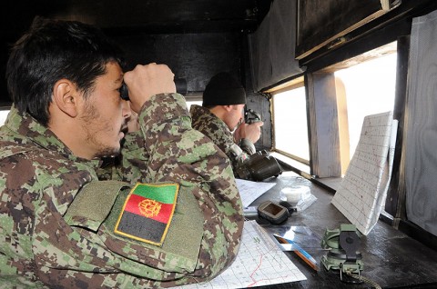 Afghan National Army 1st Lt. Mohamad Raza, 2nd Lt. Shamsu Rahman, both forward observers with 2nd Kandak, 2nd Infantry Brigade, 203rd Corps, examine the landscape during a live-fire training event at Forward Operating Base Sharana Jan. 31st. (Photo by U.S. Army Sgt. Luther L. Boothe Jr., Task Force Currahee Public Affairs)