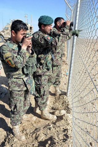 Senior Afghan National Army leadership with 2nd Kandak, 2nd Brigade, 203rd Corps, observe mortar rounds landing on targets as their newly-trained forward observers call for fire during a live-fire training scenario Jan. 31st, 2011. (U.S. Army photo by Sgt. Luther L. Boothe Jr., Task Force Currahee Public Affairs)