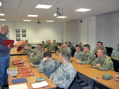 Einsidlerhof Air Base, Germany - Course instructor John Uhlenhake speaks to forward observers at the Joint Fires Observer Course held at Einsidlerhof Air Base, Germany, during two classes held in January 2011. (Photo by U.S. Army Sgt. Justin Schade, Task Force Currahee, 4th Brigade Combat Team, 101st Airborne Division)