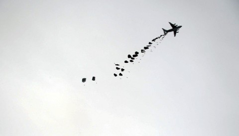 A C-17 Globemaster II drops essential supplies of water and fuel by the container delivery system method Jan. 30th at Forward Operating Base Waza Khwah. Resupply by air is the only way for Soldiers at FOB Waza Khwah from Company D, 1st Battalion, 506th Infantry Regiment to receive basic supplies. (U.S. Army photo by Spc. Kimberly K. Menzies, Task Force Currahee Public Affairs)