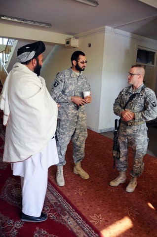 Haji Ibrahim, member of the Peace Council greets U.S. Army Col. Sean M. Jenkins, commander of Task Force Currahee, before the start of a peace conference hosted by Paktika Province Gov. Moheebullah Samim and the Peace Council at the Governor Provincial Center Jan. 22nd. (Photo by U.S. Army Spc. Kimberly K. Menzies, Task Force Currahee Public Affairs)