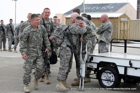 SSG Jennings welcoming home members of his unit returning from deployment in Afghanistan