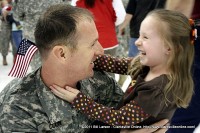 A father drinks in the bubbly personality of his young daughter