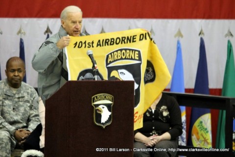 Vice President Biden displays the 101st Airborne Division Flag he was given by Maj. Gen. Campbell