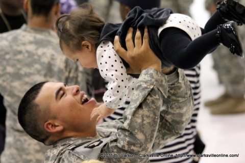 A 3rd Brigade soldier greets his daughter