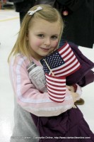 A young girl is waiting for her daddy to arrive