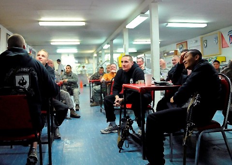 Soldiers stationed at Forward Operating Base Lightning gather to enjoy the Super Bowl Feb. 7th. (Photo by U.S. Army Capt. Kenneth A. Stewart, 17th Public Affairs Detachment) 