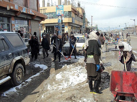 Workers hired as part of the new cash-for-work program in Sharana, Paktika Province, clean up the streets of the Sharana bazaar March 5th. The program, which officially kicked off Jan. 5th, uses commander’s emergency relief program funds to pay the workers. (Photo by U.S. Army 2nd Lt. Paul Billy, Task Force Currahee)