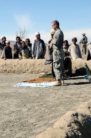 U.S. Army Spc. Stephen Hirt, 101st Airborne Division, and member of the Islamic faith, prays with Afghans at a village mosque west of Forward Operating Base Sharana, March 14th. (Photo by U.S. Army Sgt. Christina Sinders, Task Force Currahee Public Affairs)