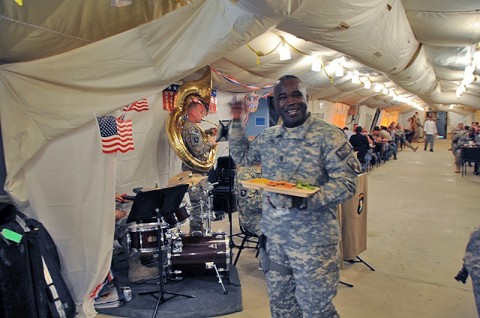 U.S. Army Command Sgt. Maj. Marvin L. Hill, keeps the beat as the 101st Airborne Division Dixieland Band greets him with his favorite song, “Rocky Top Tennessee,” at Forward Operating Base Sharana March 10th. Hill stopped at the dining facility for a meal and to listen to the band while visiting Soldiers at Task Force Currahee, 4th Brigade Combat Team, 101st Airborne Division. (Photo by U.S. Army Spc. Kimberly Menzies, Task Force Currahee Public Affairs)