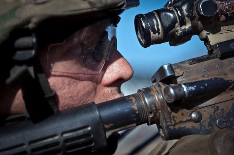 U.S. Army Sgt. Nathaniel S. Gray, an infantry squad leader from Tupelo, MS, assigned to Company B, 2nd Battalion, 327th Infantry Regiment, 1st Brigade Combat Team, 101st Airborne Division, scans the mountainside during a recent combat operation in eastern Afghanistan's Kunar Province March 16th. Gray is on his third combat tour. (Photo by U.S. Army Sgt. 1st Class Mark Burrell, Task Force Bastogne Public Affairs)