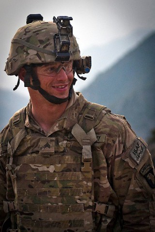 Taking a moment to check on fellow Soldiers, U.S. Army Sgt. Nathaniel S. Gray, Task Force No Slack, walks to different fighting positions during a combat operation in eastern Afghanistan's Kunar Province March 18th.(Photo by U.S. Army Sgt. 1st Class Mark Burrell, Task Force Bastogne Public Affairs)