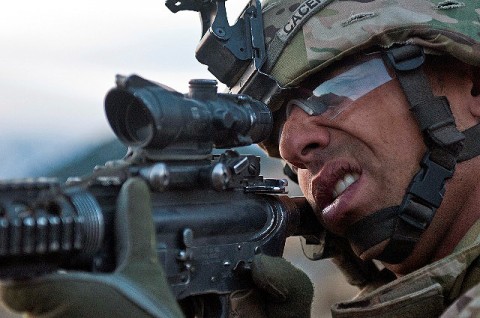 At first light of Operation Eagle Talon, U.S. Army Spc. Jose M. Caceres, an infantryman from Boston, 101st Airborne Division, Task Force No Slack, uses his advanced combat optics to get a closer look at the Shigal Valley in eastern Afghanistan March 16th. The clearing operation lasted for three days and netted seven detainees and several insurgent weapons. (Photo by U.S. Army Sgt. 1st Class Mark Burrell, 210th Mobile Public Affairs Detachment)