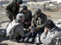 Maj. Burton Newman, a doctor for Task Force Currahee, and a native of Tallahassee, FL, prepares medical supplies that will be used by the Afghan National Army medics and doctor during a 4th Brigade Combat Team, and the ANA 203rd Corps, Combined Medical Assistance Team trip to Marzak, March 15th. (U.S. Army Photo)