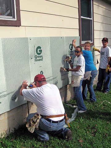 Siding is being installed during this Clarksville, TN World Changers project.