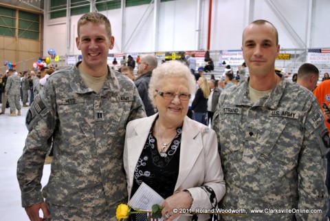 87 year old Thelma Marsh stands between her grandson Captain Chris Hess and her pen pal SPC Strand 87 year old Thelma Marsh stands between her grandson Captain Chris Hess and her pen pal SPC Strand
