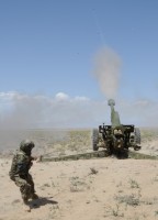 An Afghan National Army artillery soldier fires a D-30 122 mm Howitzer during a live-fire exercise April 26th in Paktika Province, Afghanistan. (Photo by U.S. Army Spc. Kimberly K. Menzies, Task Force Currahee Public Affairs)