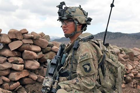 U.S. Army Pfc. Aharon S. Nelson, the platoon radio transmission officer for Task Force White Currahee, Easy Company, 2nd Battalion, 506th Infantry Regiment, 4th Brigade Combat Team, 101st Airborne Division and native of Thornton, CO, pulls security during Operation Overlord in Naka district, Afghanistan, April 14th. (Photo by U.S. Army Spc. Zachary Burke)