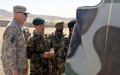 U.S. Army Command Sgt. Maj. Scott Schroeder, Combined Joint Task Force-101 and Regional Command – East command sergeant major, and Afghan National Army 201st Corps Command Sgt. Maj. Ziaulhaq Amanzai watch training at Forward Operating Base Gamberi March 30th. Schroeder visited the FOB to award Amanzai the Sgt. Audie Murphy Award for his outstanding leadership and dedication to his troops. (Photo by U.S. Army Sgt. Scott Davis, Combined Joint Task Force-101 Public Affairs)