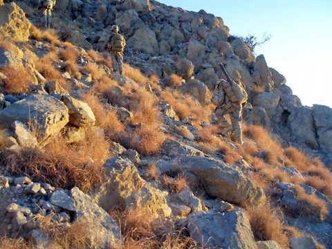 Soldiers from Dog Company, 2nd Battalion, 506th Infantry Regiment, 4th Brigade Combat Team, 101st Airborne Division, Task Force Currahee, climb mountainous terrain March 28th during an operation to clear key terrain near the Afghanistan and Pakistan border to deny insurgents freedom of movement across the border. (Photo by U.S. Staff Sgt. Matt Graham, Task Force Currahee Public Affairs)