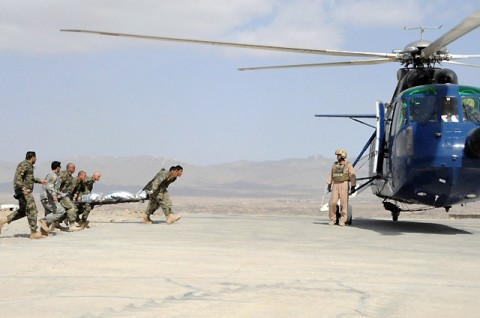 Afghan National Army medics prepare to load a simulated casualty on a helicopter during a combat medical competition held by U.S. Army Task Force Currahee Soldiers from the 101st Airborne Division April 5th at Forward Operating Base Thunder in Paktiya Province, Afghanistan. (Photo by U.S. Army Sgt. Luther L. Boothe Jr., Task Force Currahee Public Affairs)