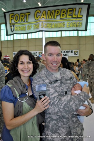 CPT Dan Walker with his wife Hillary and their son