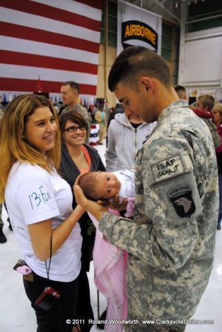 PFC Charles Kull with his wife Sarah Kull and their 16 day old child