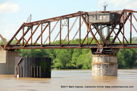 The swollen Cumberland River rushing past the Old Railroad Bridge at Riverside Drive, Clarksville TN.