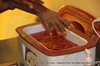 In a paraffin hand massage the hand is dipped into warm paraffin wax several times